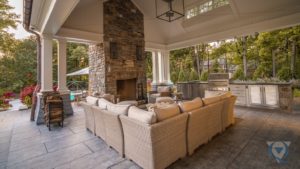 Custom outdoor fireplace and outdoor kitchen in Lake Forest, Illinois