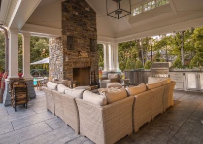 Custom outdoor fireplace and outdoor kitchen in Lake Forest, Illinois